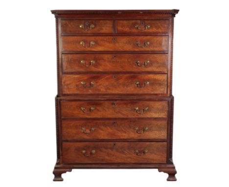A GEORGE III MAHOGANY CHEST ON CHEST with a dentil cornice, above two short and three long drawers, flanked either side by eg