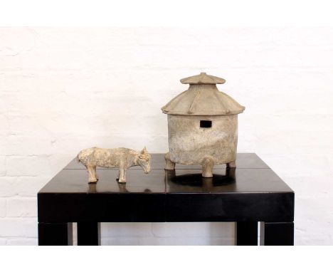 A Chinese Han Dynasty Pottery Model Grain Store And an Ox or Water Buffalo Figure A Chinese Han Dynasty Pottery Model Grain S