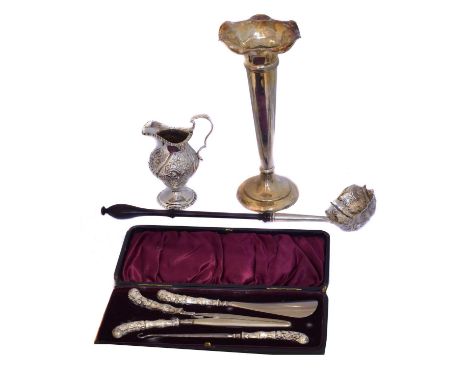A selection of silver,  A selection of silver, to include a vase, ladle, cream jug, and cased silver handled dressing set (4)