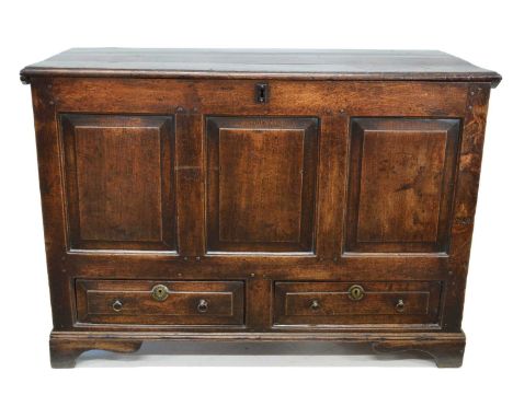 18th Century Oak Mule Chest Moulded three plank top, over three raised and fielded panels to the front above two short drawer