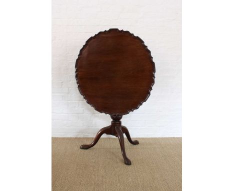 A George III Mahogany Tripod Occasional Table A George III Mahogany Tripod Occasional Table, with piecrust rim and birdcage a