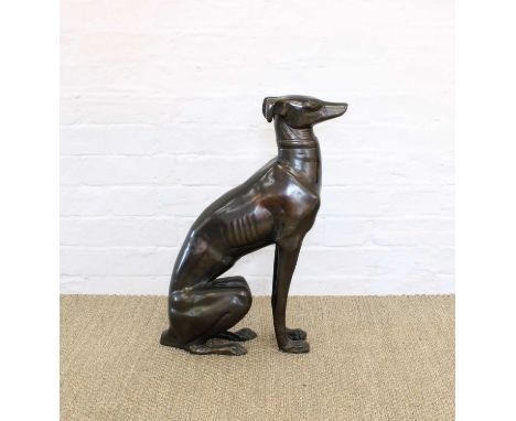 A Bronzed Spelter Figure of a Greyhound A Bronzed Spelter Figure of a Greyhound, 20th century, modelled seated, apparently un