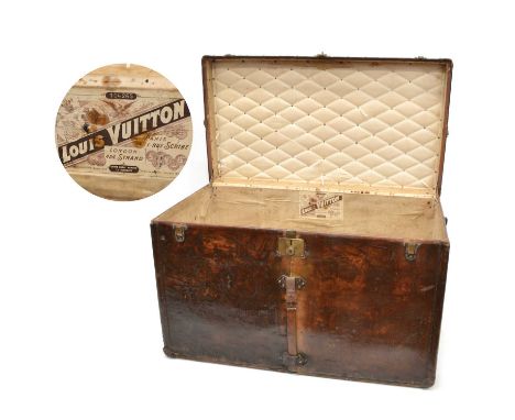 Louis Vuitton Impressive and Early Travelling Trunk Circa 1890-1910, of large size and in studded tan leather with brass lock