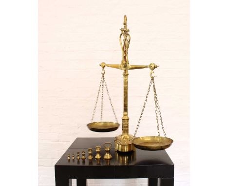 A Large Set of Brass Beam Scales by Librasco A Large Set of Brass Beam Scales by Librasco, with two pans and a graduated set 
