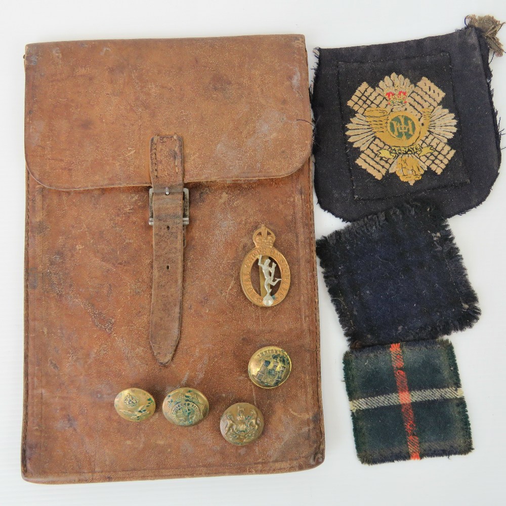 A Wwii Leather Map Pouch Together With Four Assorted Military Brass 