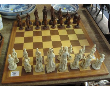 Modern chess set and board with various mythical and other figures, policeman, Sherlock Holmes, Dr Watson etc.