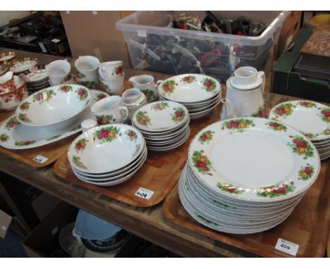 Three trays of trade winds of rose design table ware to include cups, saucers, plates, bowls, tea pot, milk jug, sucrier etc.