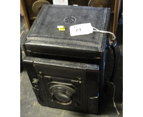 A Thornton Pickard 'Special Ruby' Reflex Plate camera, the case black leather covered with bellows focus and T.P. Cooke Anast