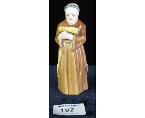Royal Worcester porcelain candle snuffer in the form of a Bible reading Friar.  Printed marks.