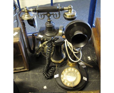 Plastic stick type reproduction telephone and another vintage design telephone. (2)