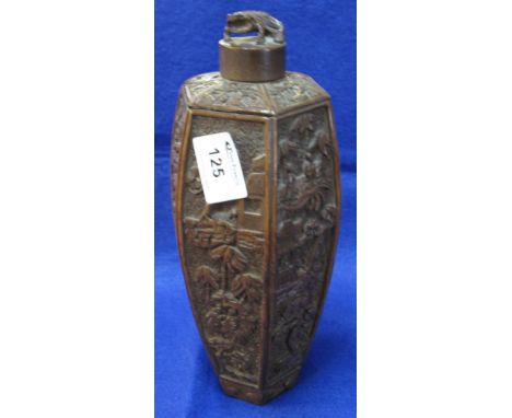 Chinese carved hexagonal shaped tea caddy with various panels depicting figural and landscape scenes.  Height approx. 26cm.
*