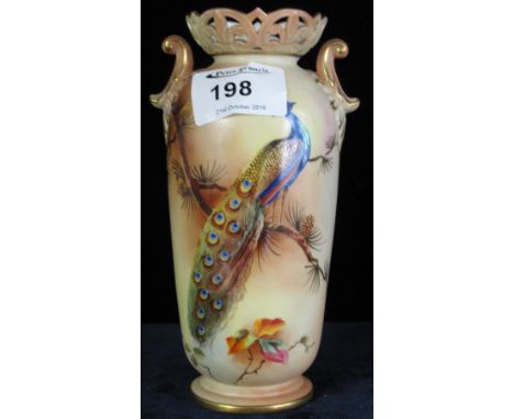 A Lock and Co. Worcester blush ivory, porcelain two handled baluster vase with reticulated pierced neck and painted peacock d