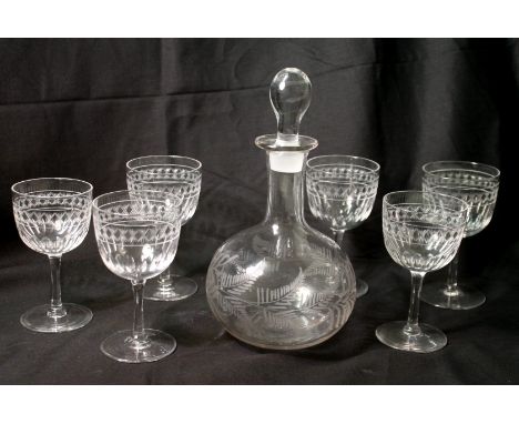 Small blown globe and shaft decanter with etched fan decoration, 22cm high and a set of six port glasses, the rounded bowls w