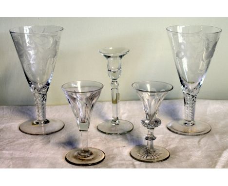 Pair of glass rummers with etched conical bowls and drawn air twist stems; two other faceted drinking glasses and a  glass ca