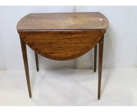 George III mahogany Pembroke table, the crossbanded oval drop flap top above bow front frieze drawer on square tapered suppor