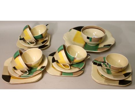 Susie Cooper part tea set with abstract decoration in green, yellow, grey and black, comprising tea cups, saucers, side plate