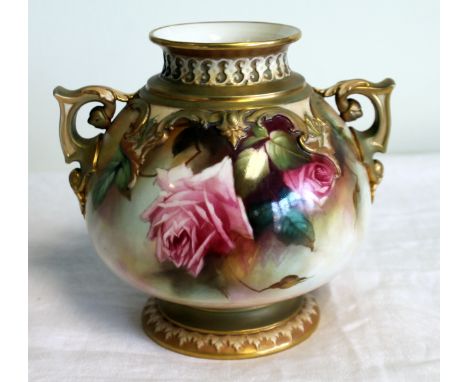 Royal Worcester porcelain vase of twin-handled squat baluster form, decorated with pink roses, signed W.E. Jarman, number 218