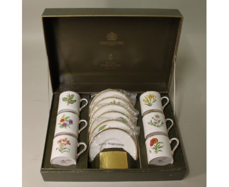 Royal Worcester bone china coffee set for six settings, each coffee can and saucer with a different floral spray,boxed.   Con