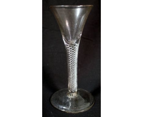 Antique drinking glass, the trumpet bowl on drawn air twist stem and domed circular foot, 16cm high.   Condition Report.  No 