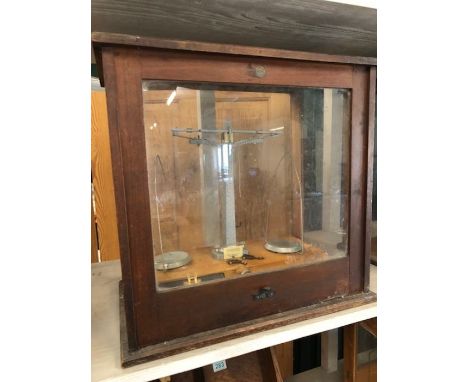 Scientific instruments: A Philip Harris Ltd of Birmingham cased set of precision weighing scales A/F and a set of weights