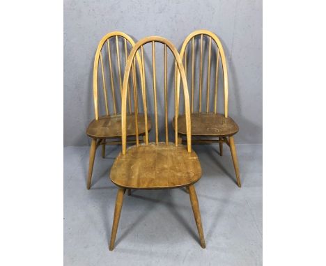 Three Ercol blond stick back chairs