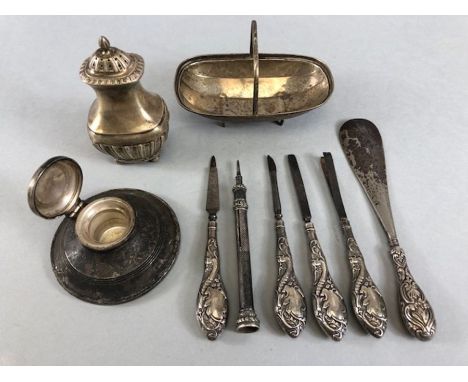 Collection of hallmarked silver items to include a silver basket, inkwell, propelling pencil and a silver handled implements 