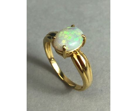 18ct Gold ring set with a cushion cut Opal approx 7mm x 9mm in a four claw setting size approx 'N' &amp; 3.2g