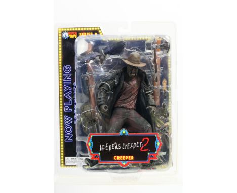 Jeepers Creepers 2 - Sota Toys - An unopened Creeper figure with accessories. The model appears Mint in its unopened packagin