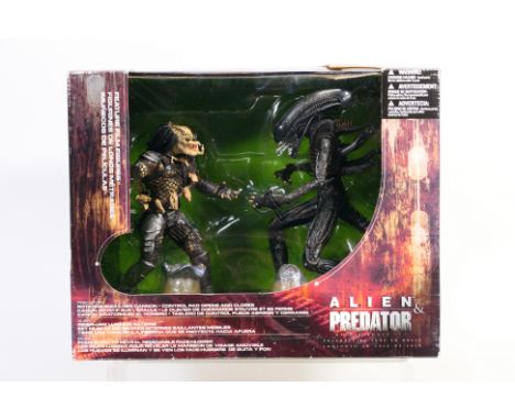 McFarlane Toys - A boxed McFarlane Toys 'Alien v Predator' Deluxe Figure Set. The set appears to be in Mint condition, presen