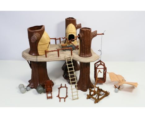 Star Wars - Kenner -  A vintage unboxed Kenner Ewok Village playset, with Ewok Catapult and Ewok Combat Glider. The Village c