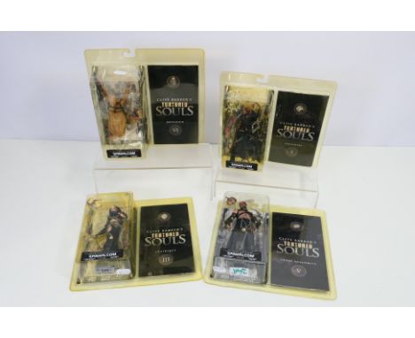 McFarlane Toys - Four boxed / carded McFarlane action figures from the series 'Clive Barker's Tortured Souls'. Lot consists o