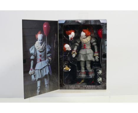 It - Neca - Reel Toys - A factory sealed It set with 7" clown figure with extra heads and accessories. Appears Mint in a Very
