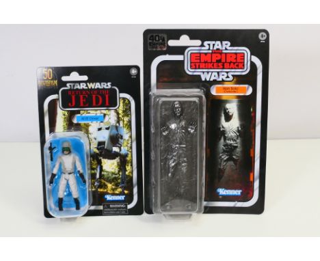 Star Wars - Kenner - 2 x unopened carded anniversary figures, an Empire Strikes Back 40th anniversary 6" Han Solo in Carbonit