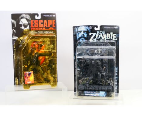 McFarlane Toys - Two boxed / carded McFarlane action figures. Lot consists of 'Movie Maniacs - Series 3 ' 'Snake Plissken - E