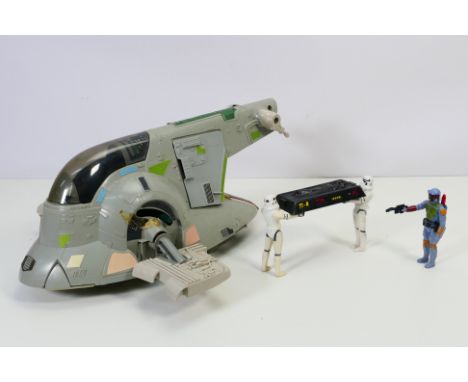 Star Wars - Palitoy - Kenner - An unboxed vintage Star Wars 'The Empire Strikes Back' Slave 1 Vehicle with three loose vintag