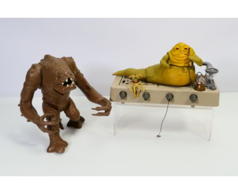 Star Wars - Kenner - An unboxed Star Wars 'Jabba the Hut' playset with an unboxed Rancor Monster. The Jabbs playset comes wit