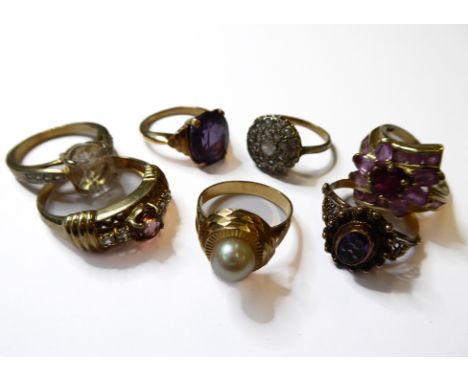 Seven gem-set dress rings, including an oval synthetic corundum ring, the shank stamped '14K', size K (approx. 4.4g); an orna