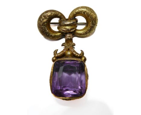 A shaped rectangular amethyst and 9-carat yellow gold pendant, scrolling and foliate surround, Birmingham hallmark, suspended