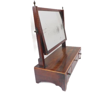 A George III period mahogany and boxwood strung toilet mirror; the rectangular horizontal plate flanked by two reeded vertica