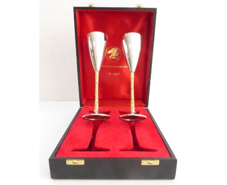 STUART LESLIE DEVLIN AO CMG (9 Oct 1931-12 April 2018), a cased pair of hallmarked silver and silver gilt goblets/flutes of t