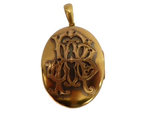 A 19th century oval two tone rose and yellow gold coloured photograph locket of very fine quality; the suspension loop above 