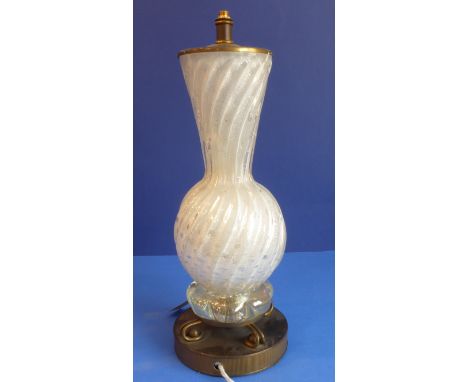 An unusual early/mid 20th century brass mounted and glass table lamp; vase-shaped wrythen glass main body with internal bubbl