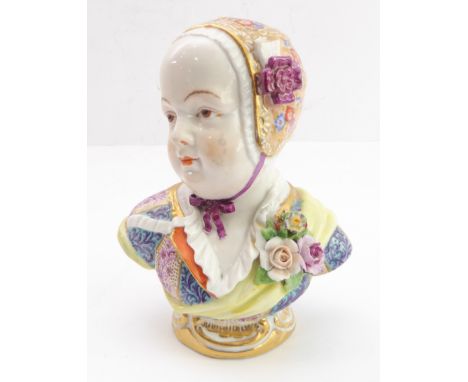 A fine late 19th century hand-decorated Continental bust  - girl wearing a gilt-highlighted cloche decorated with flowerheads