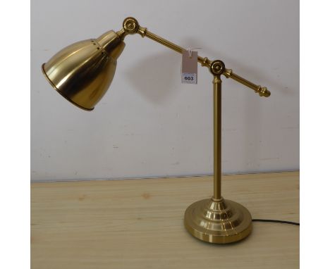 A modern adjustable desk lamp in 19th century anglepoise style with adjustable shade and height etc.&nbsp;