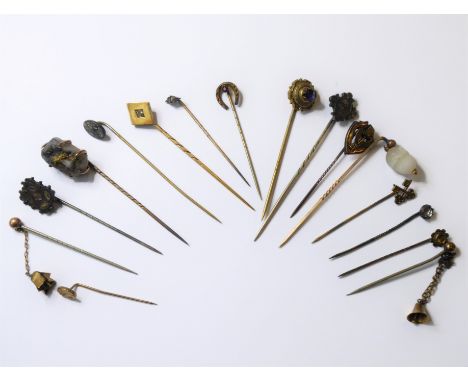 Sixteen assorted stick pins, mostly Victorian, some mounted in yellow gold including a yellow gold rhomboid centrally-set wit