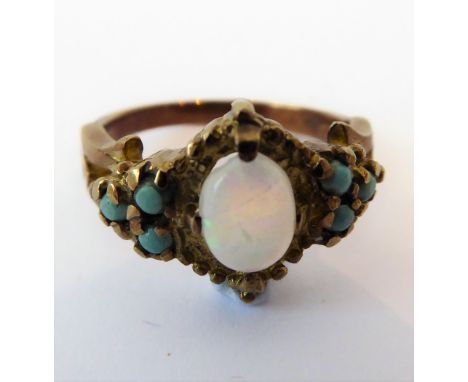 An opal and turquoise-set dress ring stamped '9CT'