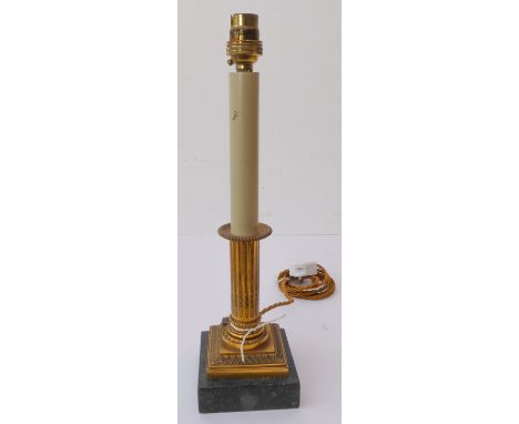 A single ormolu table lamp of classical column form upon a black square marble base (total height including electrical fittin