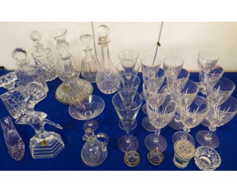 A selection of glassware to include 6 decanters, a set of 8 hand-cut wine glasses with circular knops, a similar set of 4 win