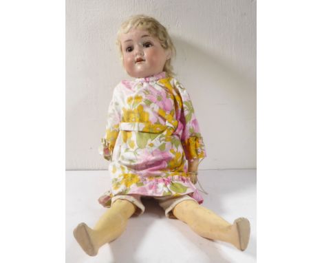 An early 20th century&nbsp;Armand Marseille&nbsp;bisque head doll; blonde hair and the back of the head marked 390 1½/2, pain
