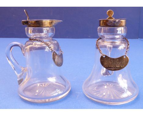 A good pair of bell-shaped whiskey tots with silver mounts and star-cut bases; the hinged lids marked for Asprey & Co London,